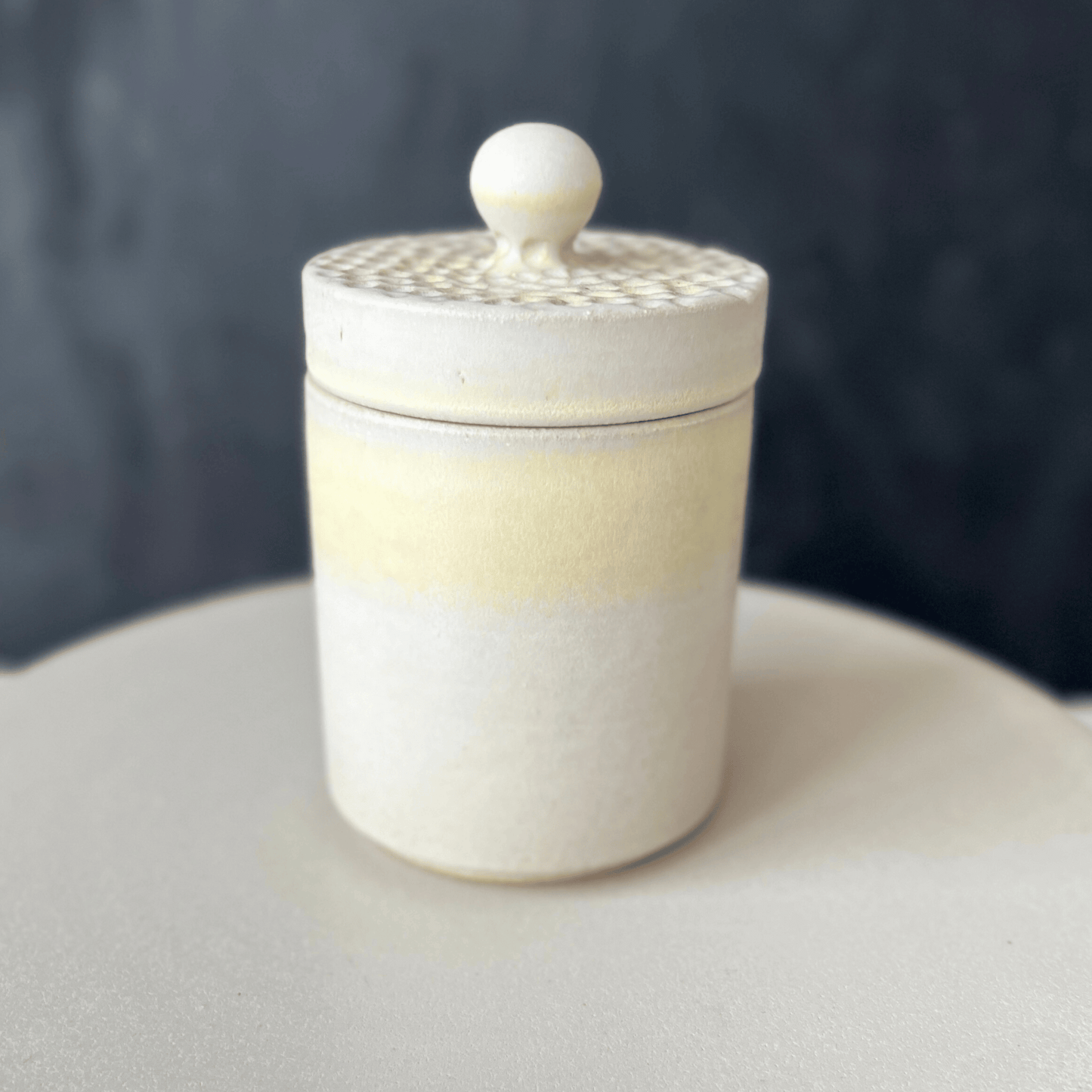 Jar with lid between